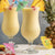 2 Pina Colada cocktails with cocktail umbrellas and cocktails 