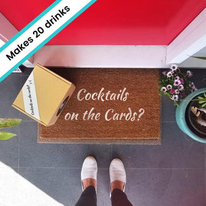 Cocktails on the cards door mat and cocktail box at red door