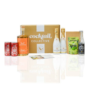 Gin subscription box with ingredients including Weekender Gin, 2x East Imperial Tonic Water,  2x Veuve Du Vernay Ice, Lime Wheel Cocktail Garnish, East Imperial Soda Water and an information card
