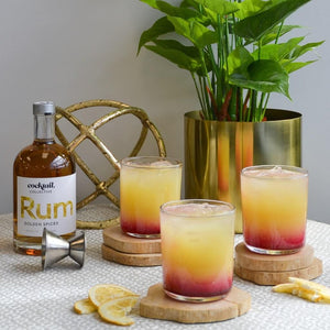 Three Hurricane Cocktails displayed on coasters