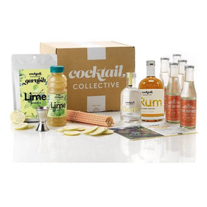 The Spiced Mule Cocktail Box with ingredients; East Imperial Ginger Beer, Spiced Rum, Gomme Syrup, Lime Wheel Garnish, Lime Juice, spirit measure, straws and an easy to follow recipe card