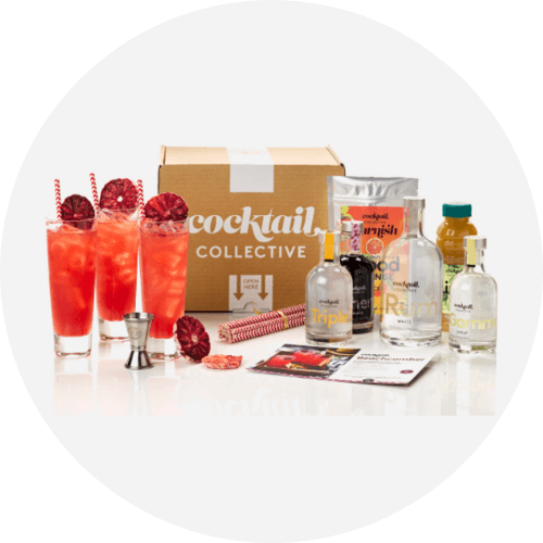 Cocktail Collective subscription box showing contents of cocktail ingredients and recipe cards
