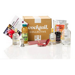 The Beachcomber cocktail box showing all the ingredients you get - White Rum, Lime Juice, Gomme Syrup, Triple Sec & Cherry Liqueur with straws, recipe card & spirit measure | Cocktail Collective 