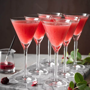 Set of 6 Schott Zwiesel Tritan Crystal Vodka Glasses filled with a bright red Cosmopolitan cocktail