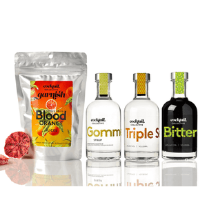 Ingredients in The Old Fashioned Essentials Kit with Bitters, Triple Sec, Gomme Syrup & Blood Orange cocktail garnish | Cocktail Collective image