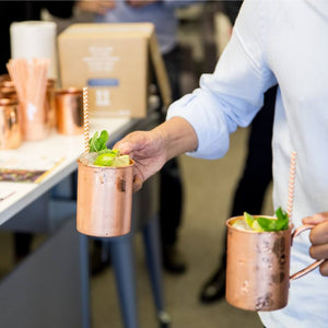 Moscow Mule cocktails in Mule mugs at office drinks