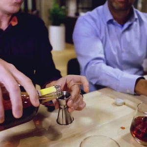 Short clip of Bourbon Old Fashioned Cocktails being stirred