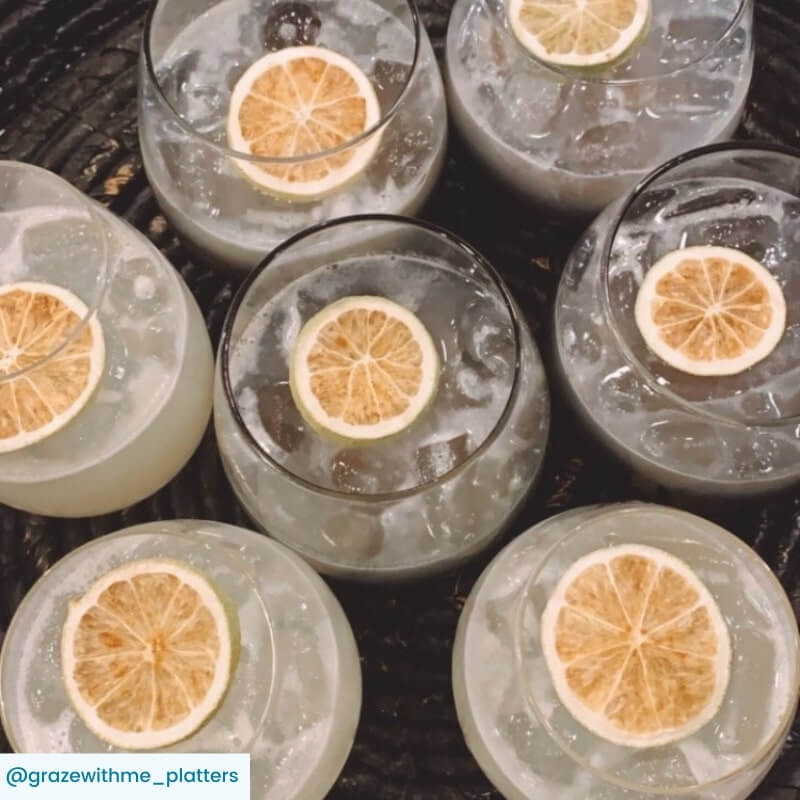 Margarita cocktails with lime wheel garnishes