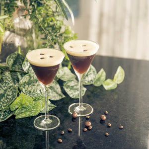 3 Espresso Martinis garnished with coffee beans 