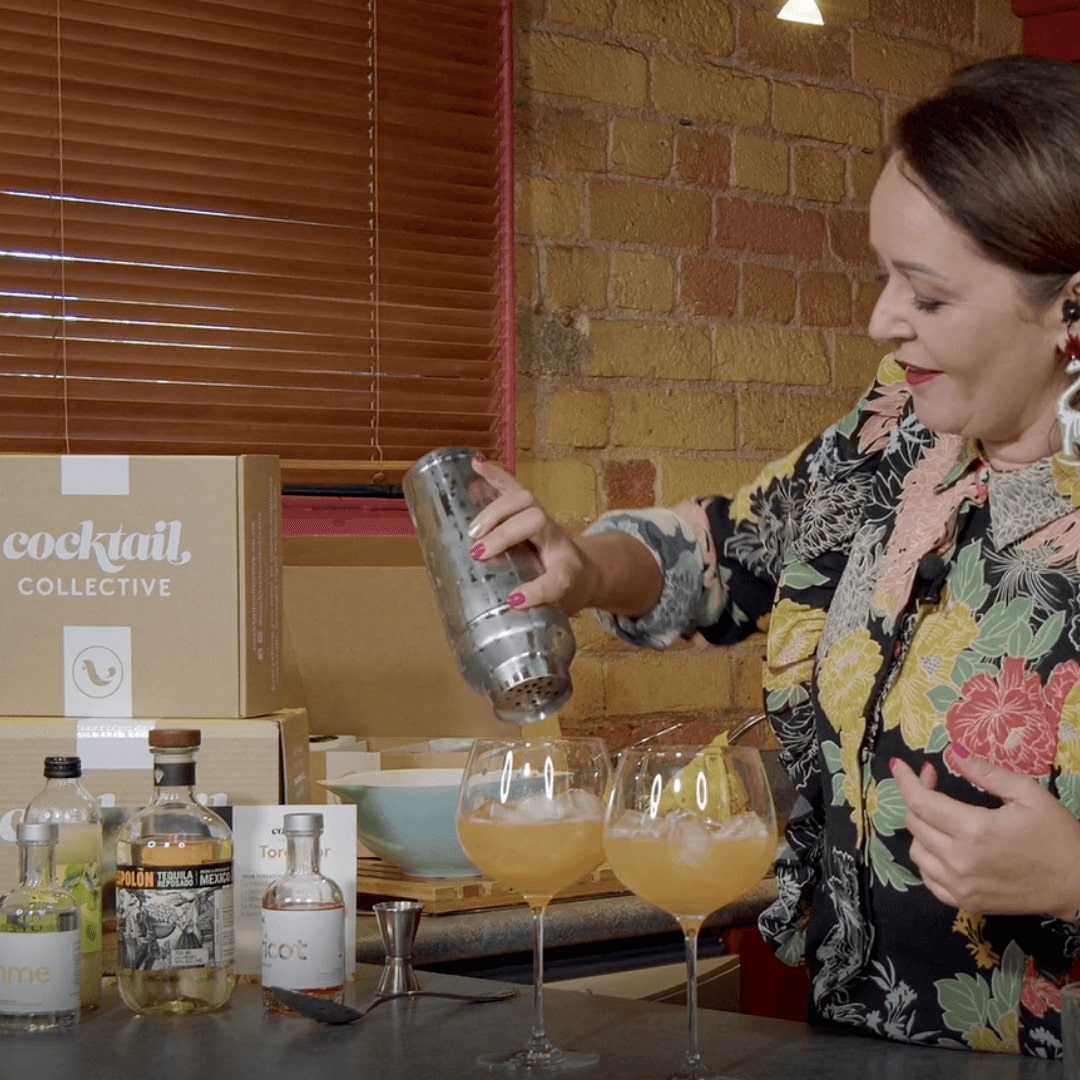 Women pouring cocktails with Cocktail Collective cocktail kits