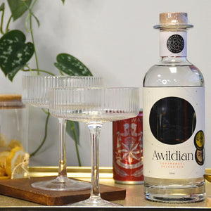 Awildian Spiced Gin with ribbed cocktail coupes