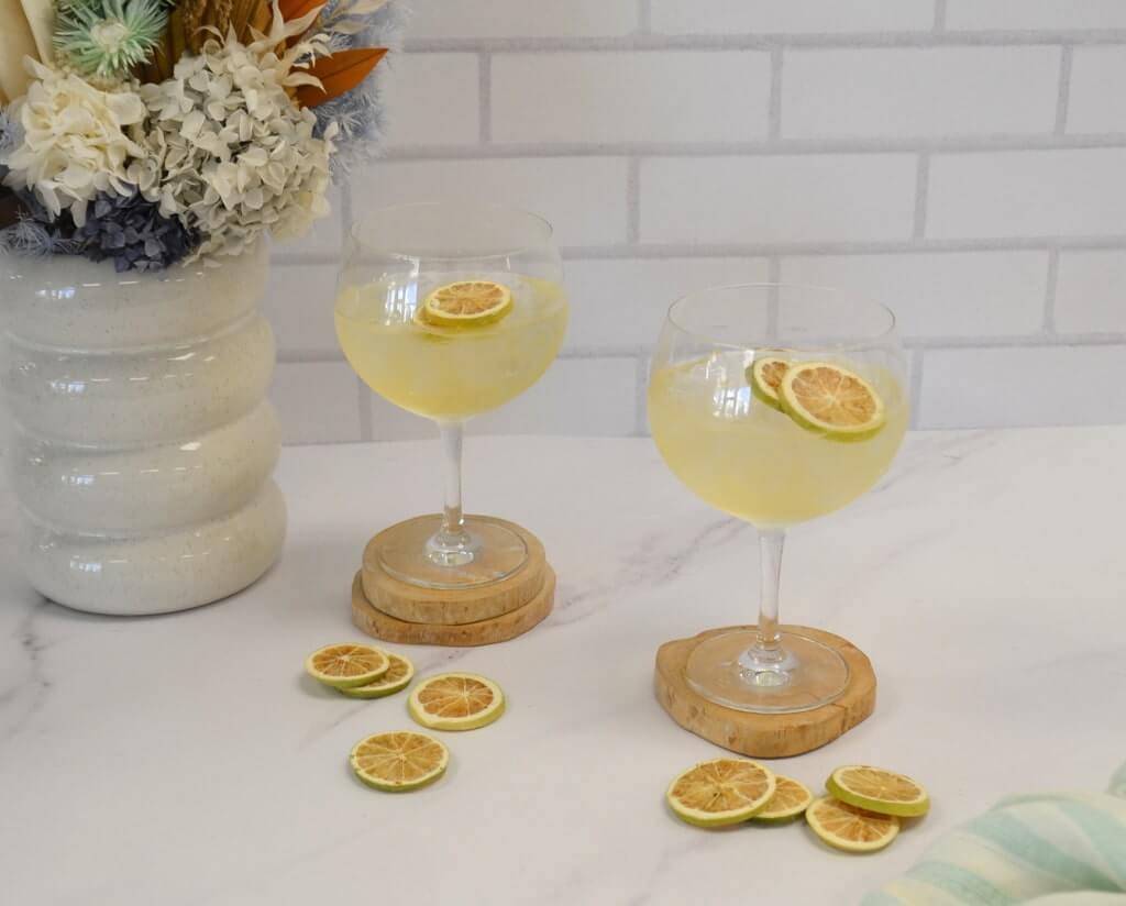 Crystal G & T Glasses filled and garnished with lime wheels
