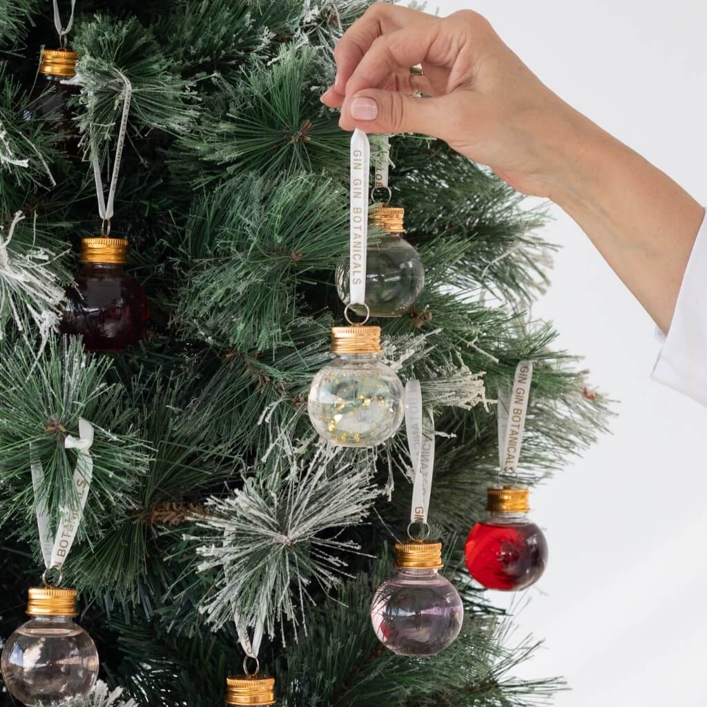 bright blue gin filled bauble, yellow gin filled bauble and clear gin filled bauble 