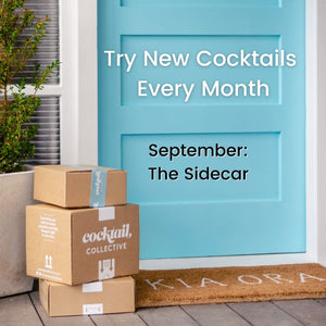 Three Cocktail Collective gift boxes delivered at a blue door with a door mat saying Kia Ora