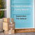 Three Cocktail Collective gift boxes delivered at a blue door with a door mat saying Kia Ora