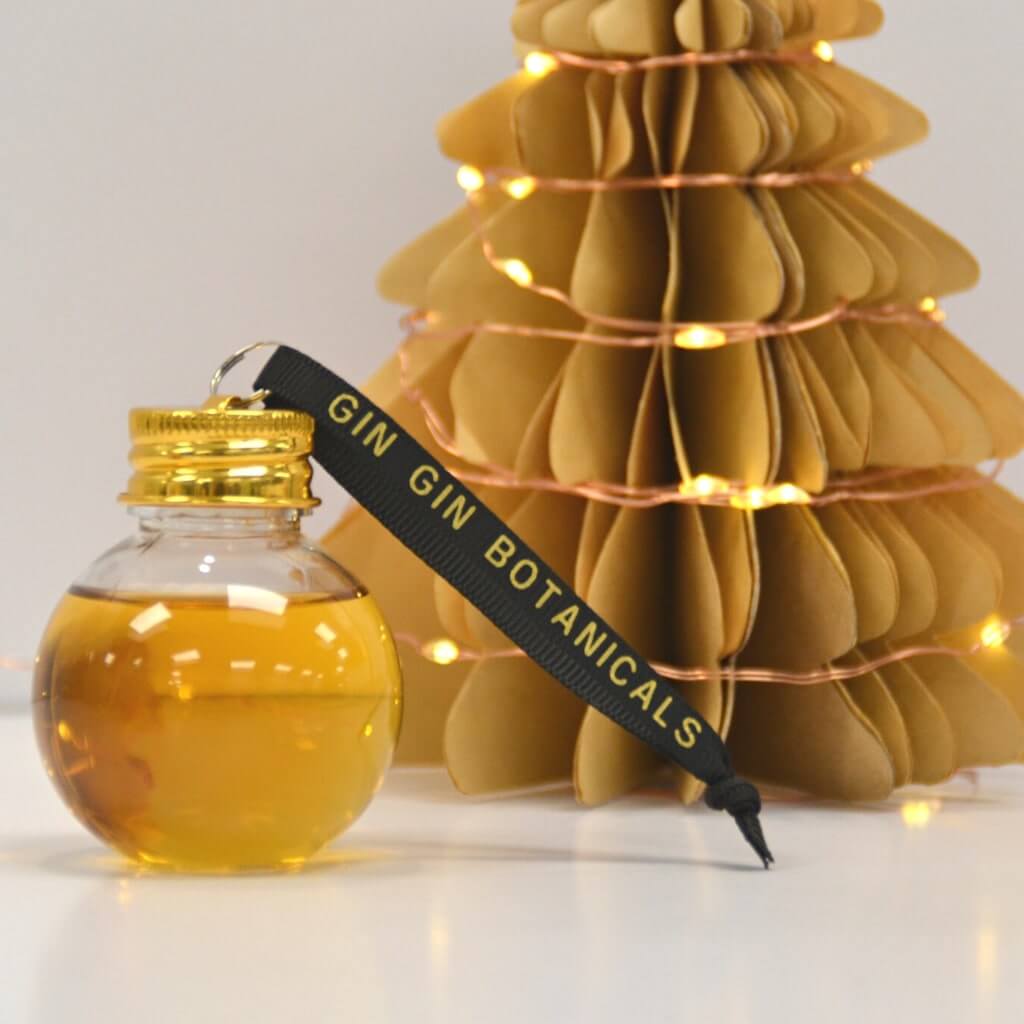 Carbon Six's Takapuna Dark Chocolate Gin in a 50ml christmas bauble 