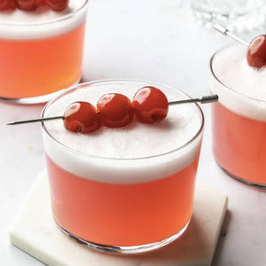 Cherry Sour garnished with 3 cocktail cherries 