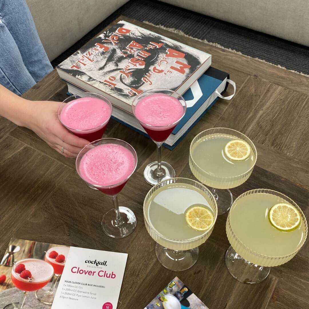 Clover Club & Daiquiri cocktails on coffee table