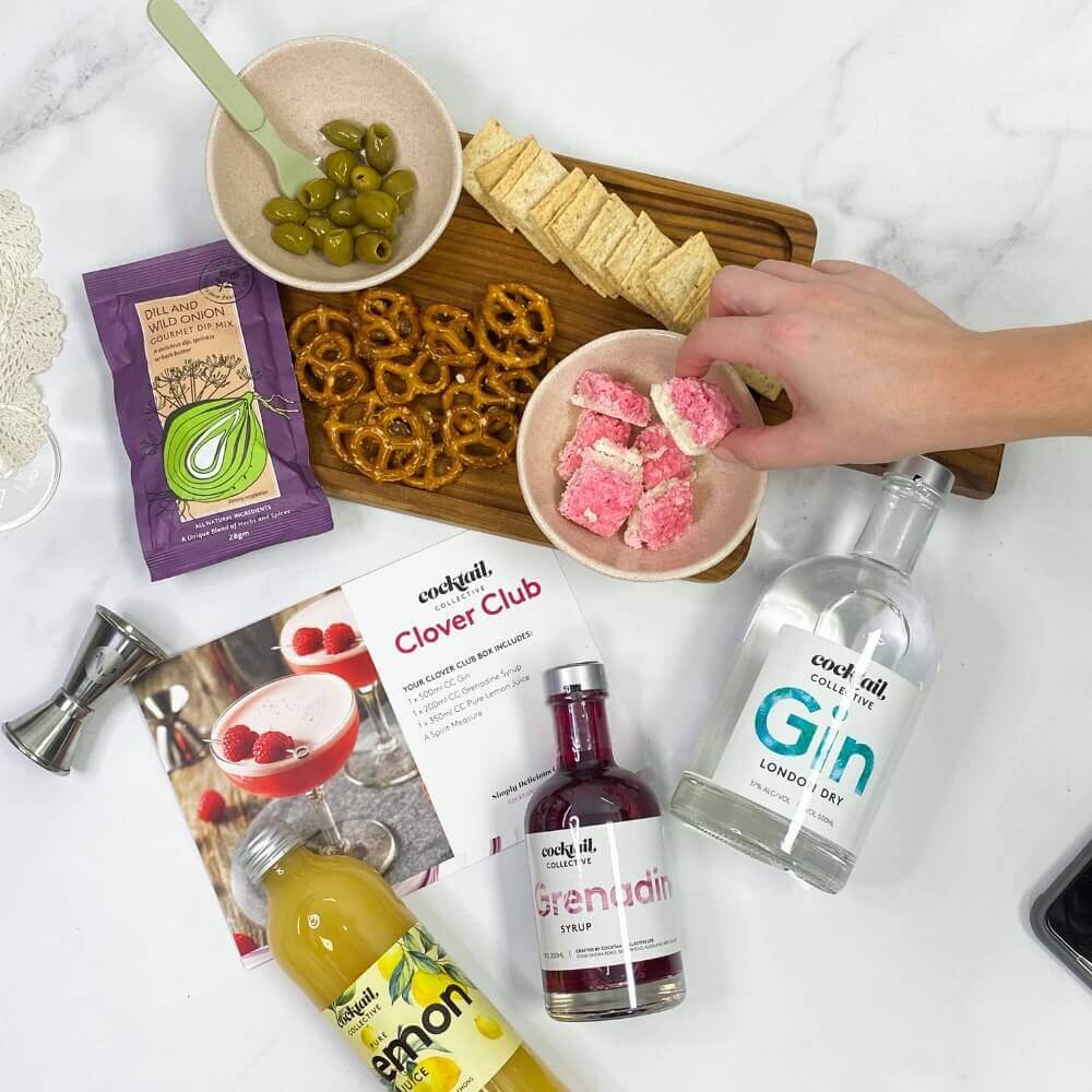 Selection of snacks & Clover Club cocktails