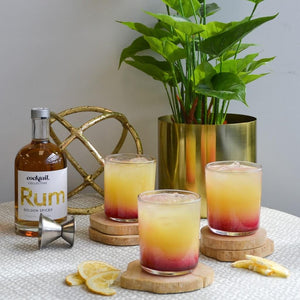 Hurricane cocktails with Spiced Rum on table