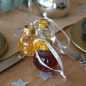 Trio of Christmas Gin abubles on table