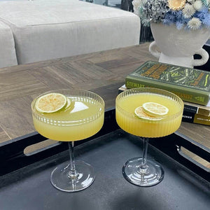 Gin Gimlet cocktails in stylish ribbed cocktail coupes