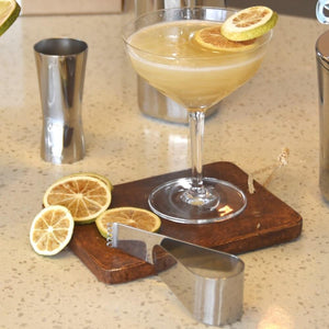 Rocks Cocktail Garnish Peeler with Lime Wheel garnish and Gin Gimlet