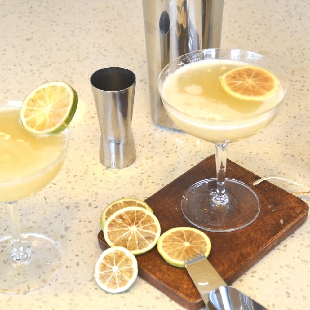 Rocks Spirit Measure with Gin Gimlet cocktails and Lime Wheel garnish