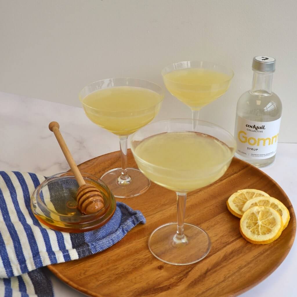 The Bee's Knees cocktails in cocktail coupes