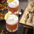 Whiskey Sour cocktails with garnish and chess board